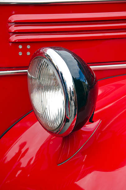 istock Headlight of antique firefighters' car 488214040