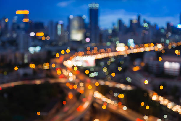 istock Blurred bokeh lights of city freeway intersection 488219804