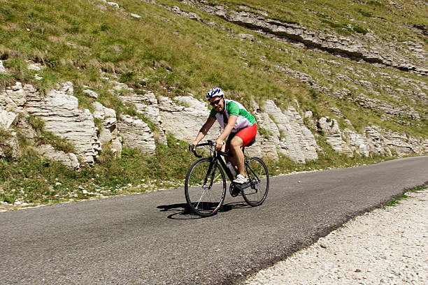 istock Cyclist pedaling in the mountains 488220034