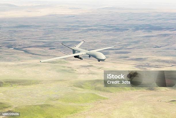 War Drone Flying Over The Desert Stock Photo - Download Image Now - Drone, Iran, Military