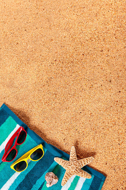 istock Beach background scene with sunglasses and starfish 488222223