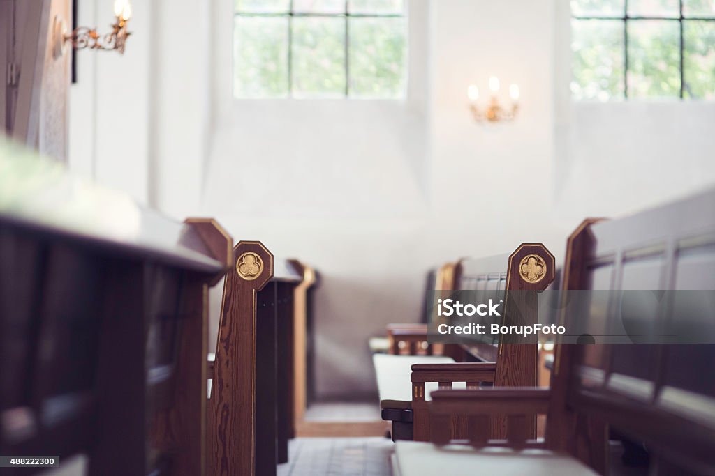 Church benches Two rows of benches in a church Church Stock Photo