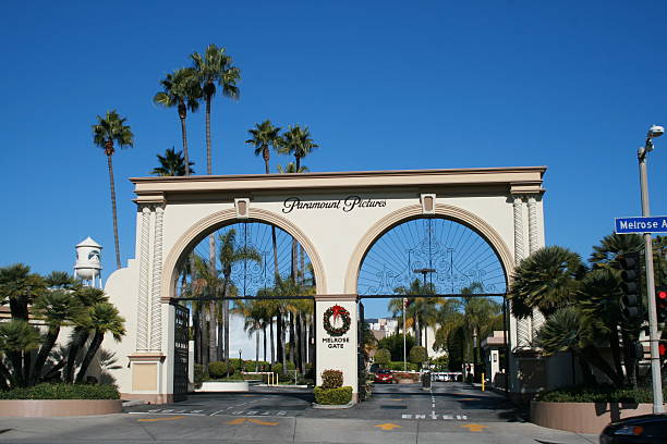 Melrose Gate of Paramount Pictures studio lot, Los Angeles Los Angeles, California, USA - December 6, 2010: Main entry gate, 'Melrose Gate', to the Paramount Pictures studio lot on Melrose Avenue, Hollywood, Los Angeles, California, USA paramount studios stock pictures, royalty-free photos & images