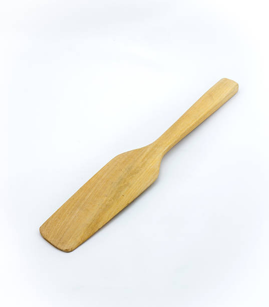 istock kitchen wooden spatula  on white background 488239988