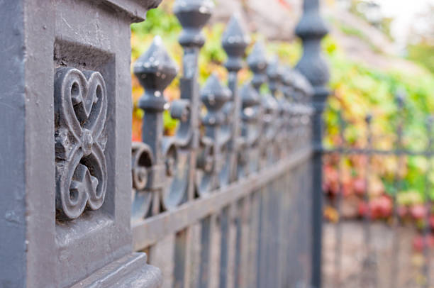 istock Metal fashion fence, column with pattern and blurred background 488241444