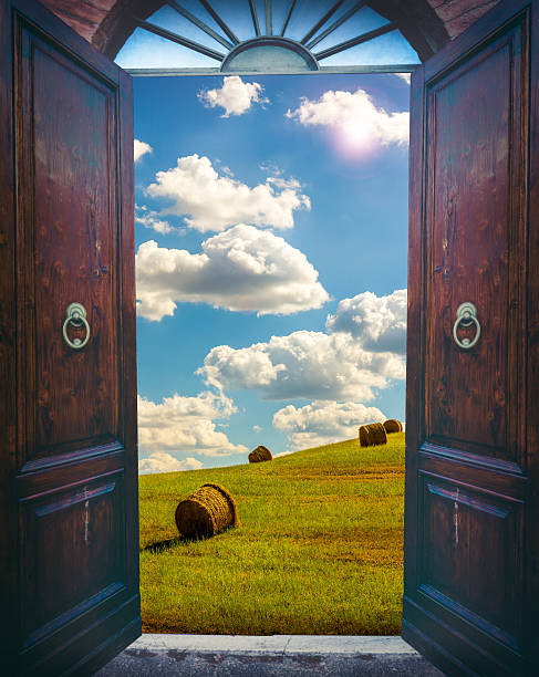istock Open door and landscape 488242166
