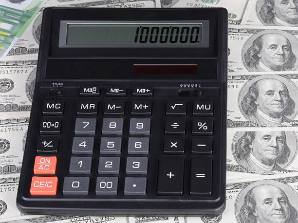 istock dollar, euro banknote and calculator 488242695