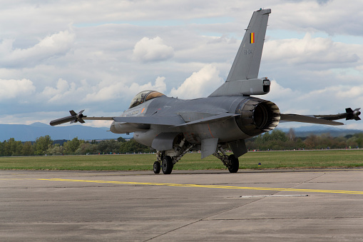 Hradec Kralove, Czech republic - September 5, 2015: Landing F-16 Fighting Falcon with Belgian flag on the CIAF - Czech international air fest on September 5, 2015 in Hradec Kralove, Czech republic.