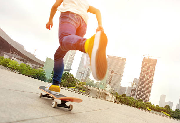 istock speeding skateboarding woman 488244135