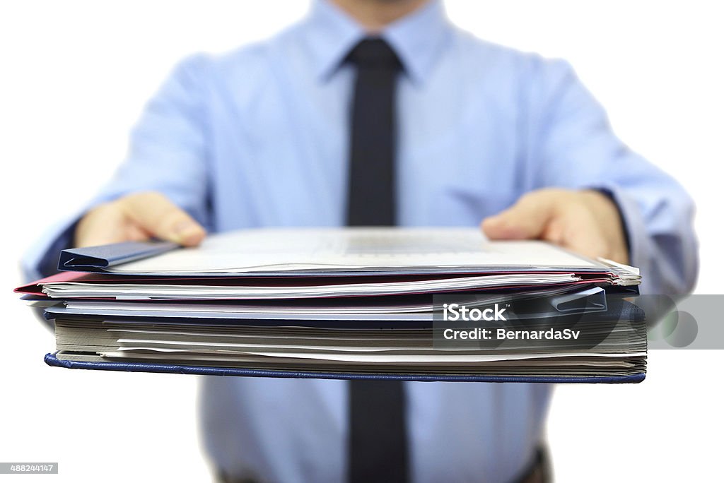 senior manager is Giving a lot of work Document Stock Photo