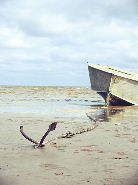 istock anchored on the shore with boat 488249934