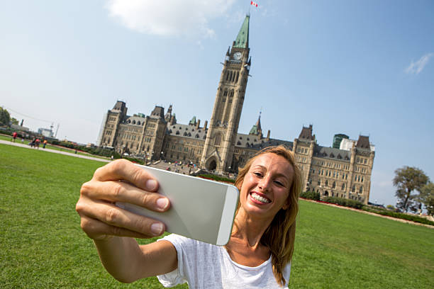 istock Young woman taking selfie in Ottawa 488251348