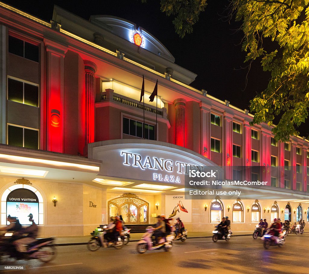 Hanoi Trang Tien Plaza Entrance At Night With Motorbike Traffic Stock Photo  - Download Image Now - iStock