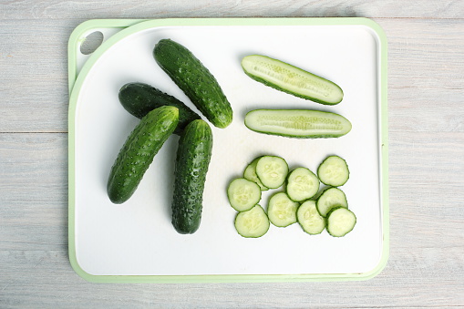 Cucumbers on cutting board
