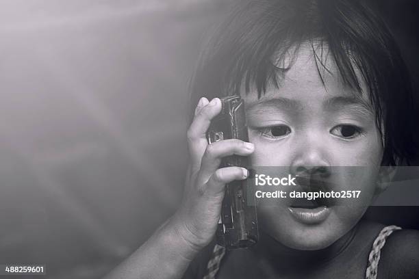 Asian Girl Who Talks On The Telephone Stock Photo - Download Image Now - Adult, Asia, Asian Culture