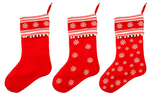 chaussette de noël rouge et blanc de flocons de neige de santa cadeaux - christmas stocking christmas christmas decoration red photos et images de collection