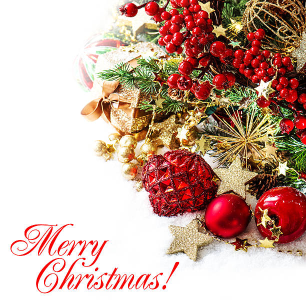 istock baubles, golden garlands, christmas tree and red berries 488262465