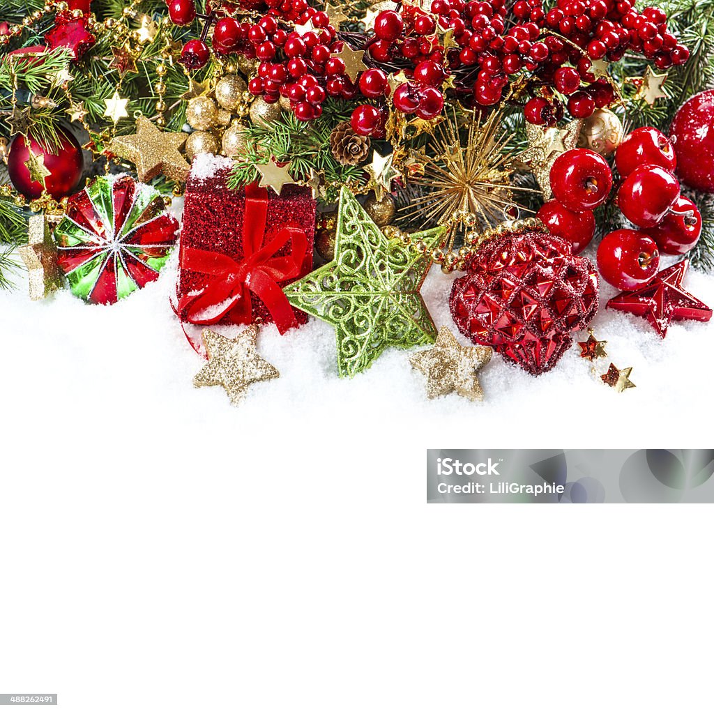 baubles, golden garlands, christmas tree and red berries festive decoration with baubles, golden garlands, christmas tree and red berries Advent Stock Photo