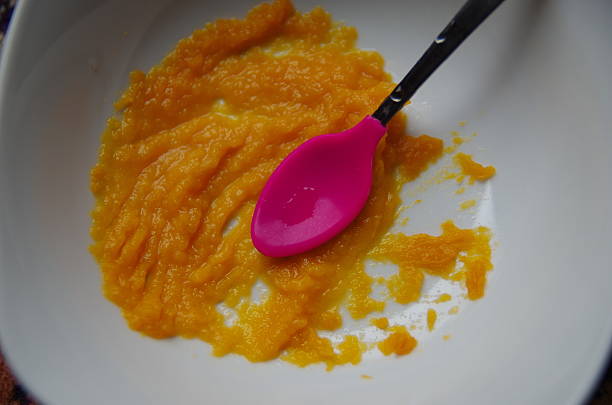 Baby Food - Mashed Sweet Potato stock photo