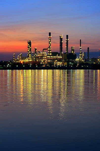 istock Sunrise scene of Oil refinery 488264143