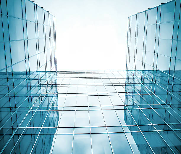 istock contemporary blue glass wall of skyscraper 488264601