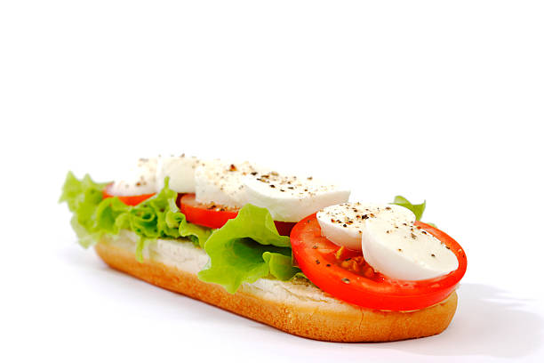 Sandwich with mozzarella tomato and salad