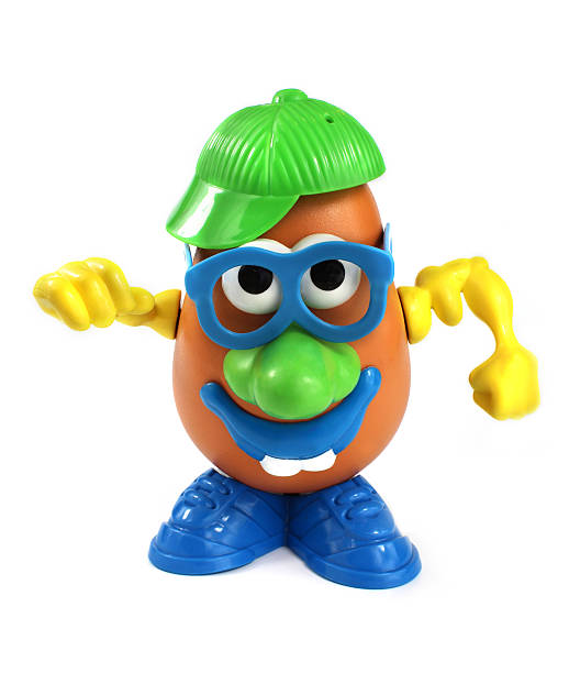 herr kartoffel-chef spielzeug von hasbro - prepared potato raw potato human head toy stock-fotos und bilder