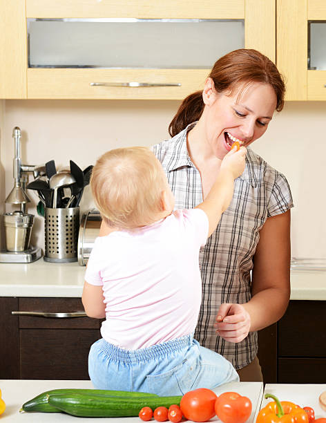 istock family cooks in the kitchen 488266465