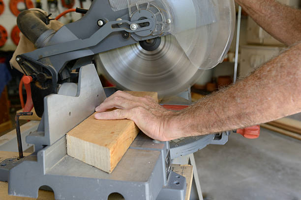 istock Builder Using Saw to Cut Wood in Shop 488268152