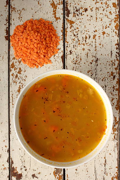 vermelho sopa de lentilhas - cooked vertical high angle view lentil imagens e fotografias de stock