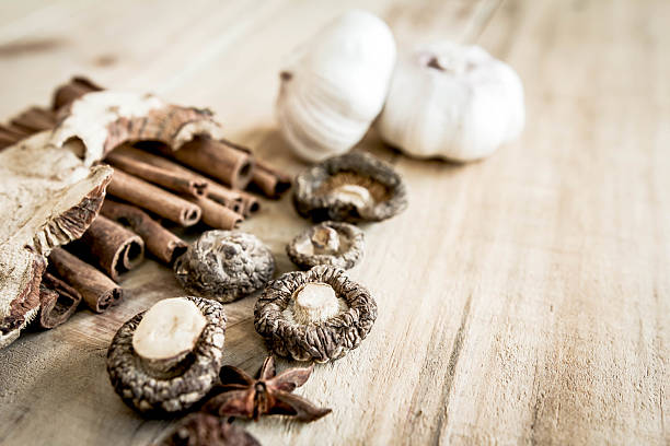 istock The dried shiitake mushrooms on old wooden table 488269348