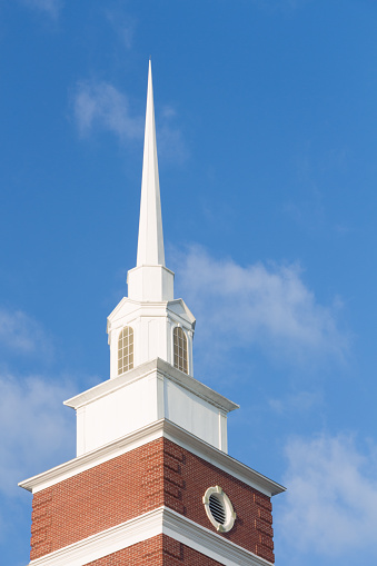 The steeple atop a Baptist Church