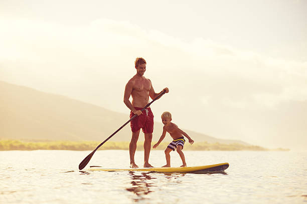 istock Father and Son Stand Up Paddling 488269938