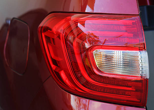 istock Close up of rear red lighthouse red car 488273714