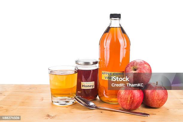 Apple Cider Vinegar With Honey Natural Remedies And Cures Stock Photo - Download Image Now