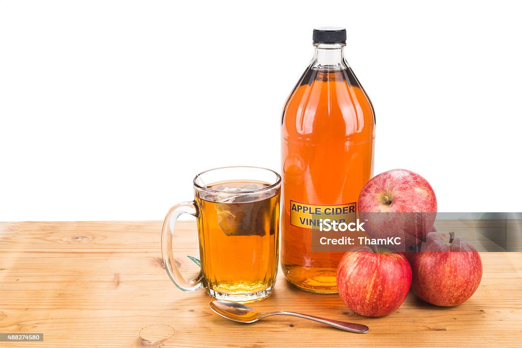 Apple cider vinegar with brewed tea, natural remedies and cures Apple cider vinegar with brewed tea, natural remedies and cures for common health condition Apple Cider Vinegar Stock Photo