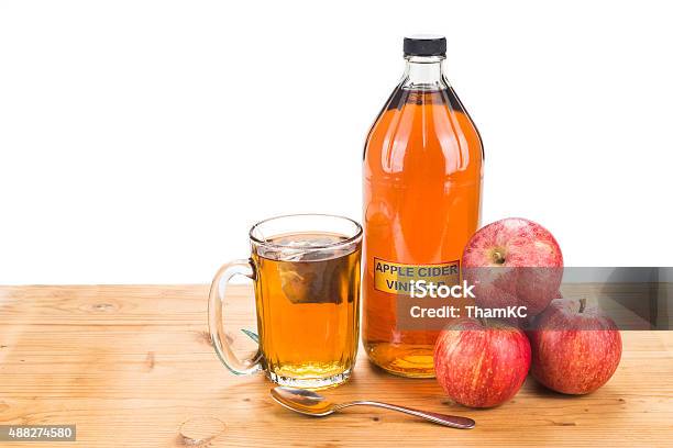 Apple Cider Vinegar With Brewed Tea Natural Remedies And Cures Stock Photo - Download Image Now