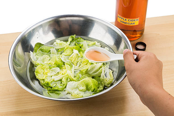 istock Apple Cider Vinegar to soak vegetable and remove pesticide residue 488275526