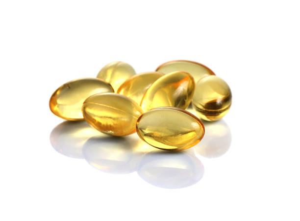 肝油ジェルカプセル、オメガ 3 - hair gel capsule cod liver oil pill ストックフォトと画像
