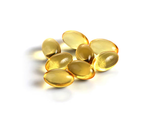 肝油ジェルカプセル、オメガ 3 - hair gel capsule cod liver oil pill ストックフォトと画像