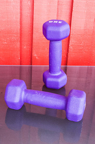 istock Purper fitness dumbbells 488276341