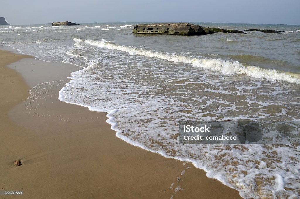 D-day in Normandy: Mulberry harbour in Arromanches. Arromanches Stock Photo