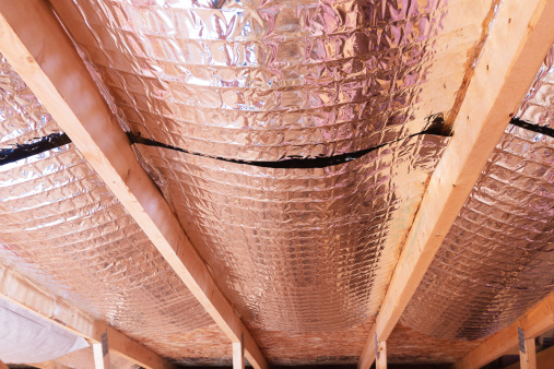 Reflective Radiant Heat Barriers Between Attic Joists Used as Ba