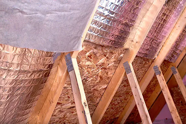 Photo of Gable View of Ongoing House Attic insulation Project