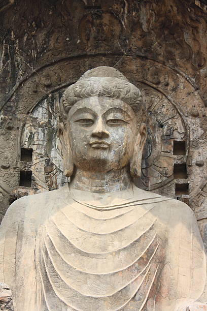 ถ้ําลัวหยางลองเมน - buddha face ภาพสต็อก ภาพถ่ายและรูปภาพปลอดค่าลิขสิทธิ์