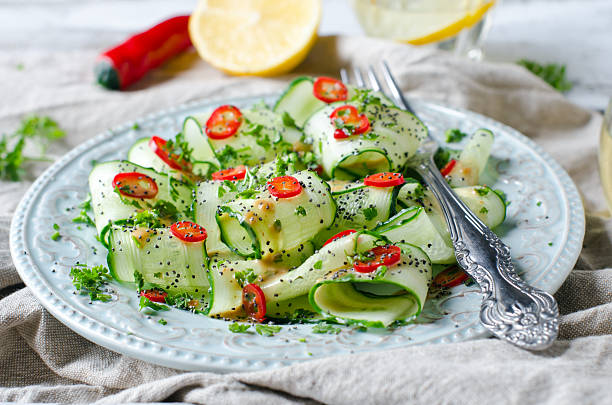 istock Salad with cucumber, pepper and poppy seeds 488277805