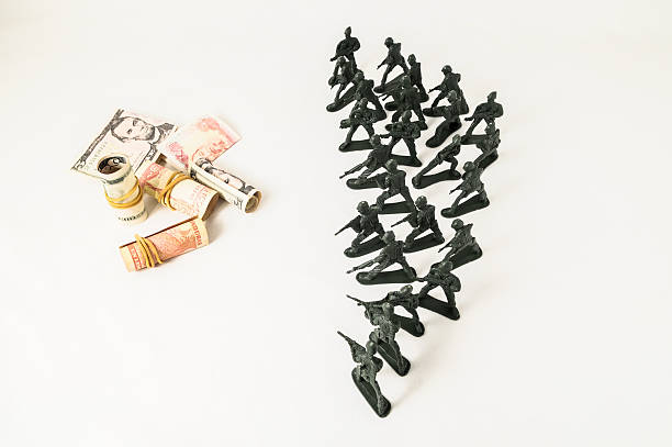 Plastic Lead Soldiers Representing War on a White Background