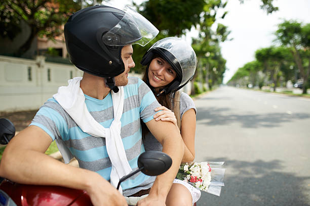 istock Couple on bike 488279092