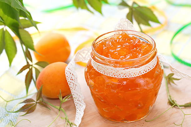 istock Apricot jam and Fresh apricots 488279450