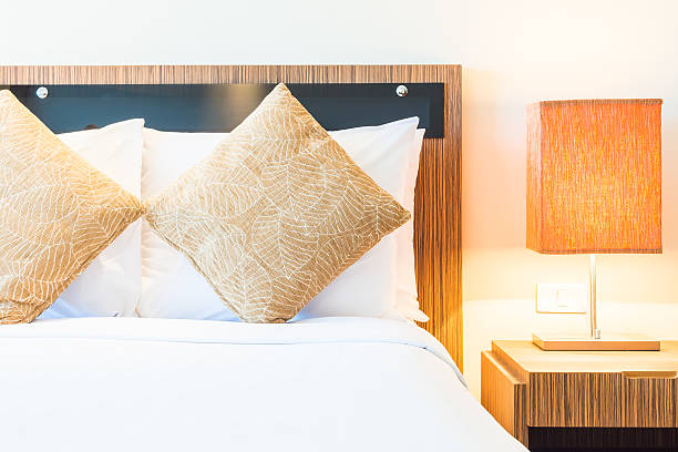 istock Pillow bed in luxury hotel room 488280454